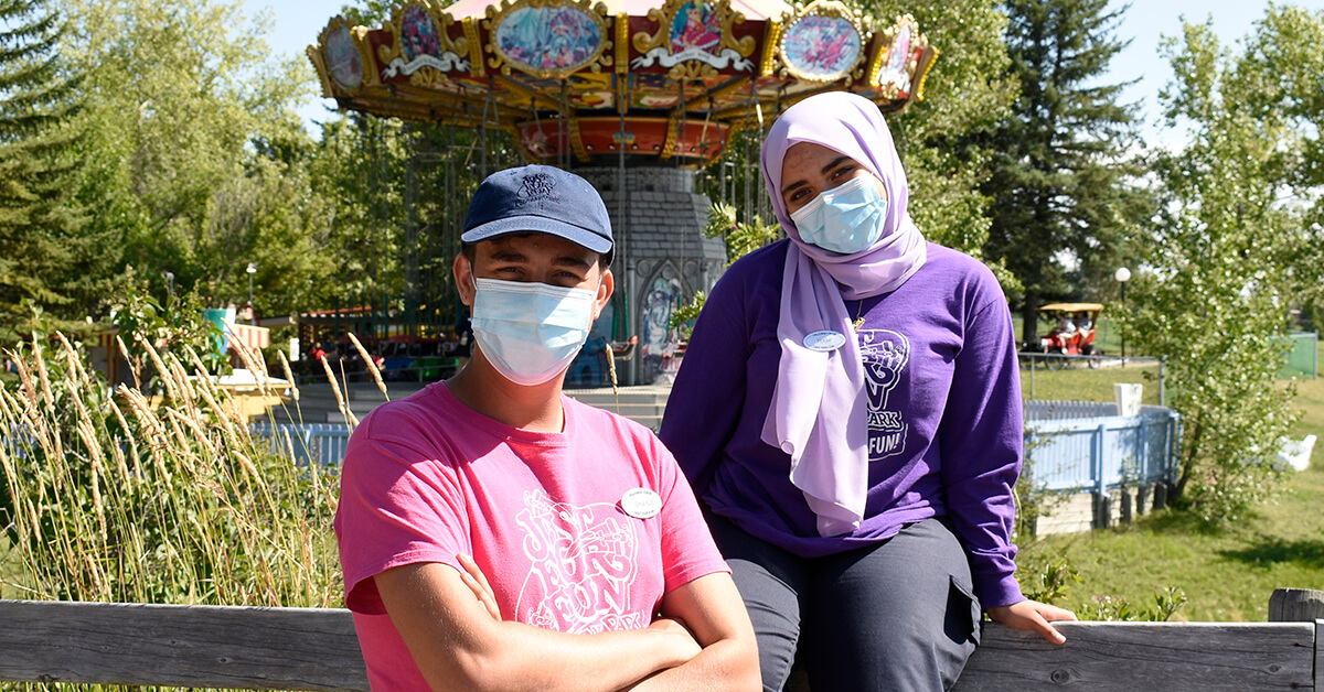 Two Calaway Park employees wearing masks